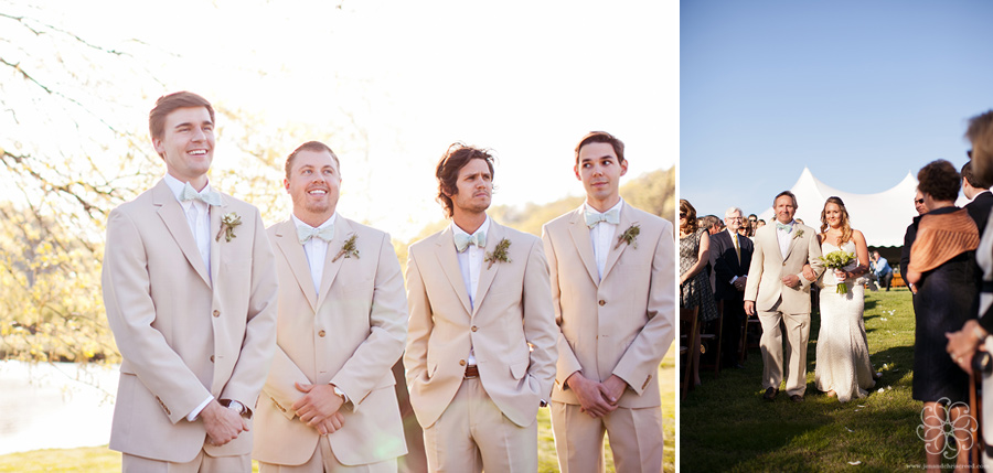 Groom watching bride walk down the aisle