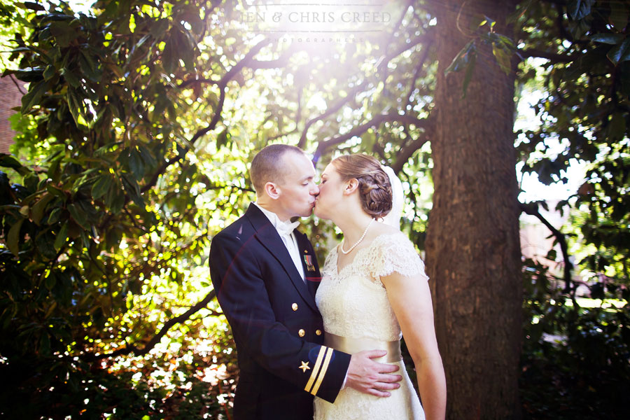 bride and groom and magnolia tree