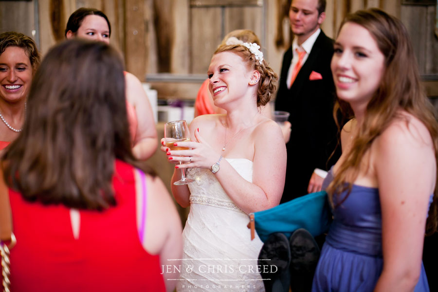 bride laughing at reception