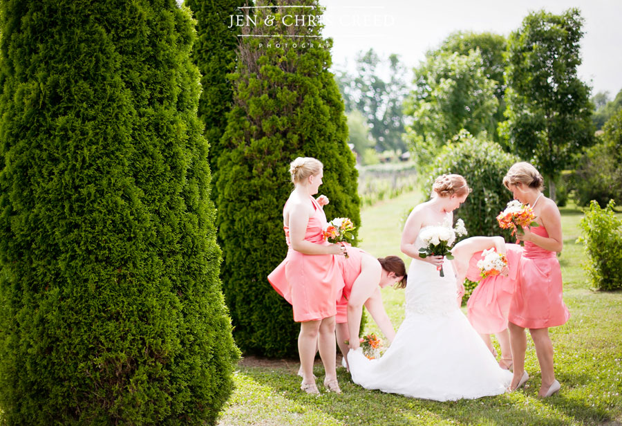 bridesmaids in coral dresses