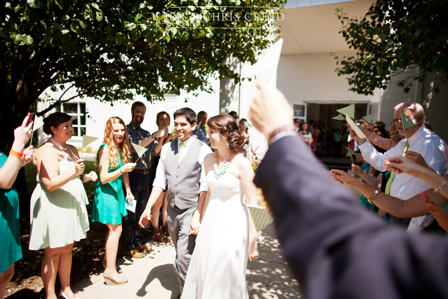 bride and groom pennant exit