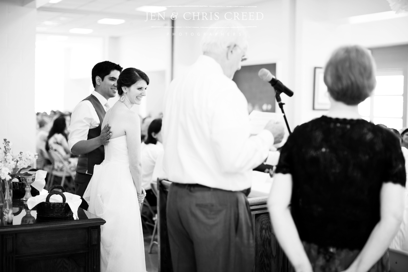 father of bride praying at reception