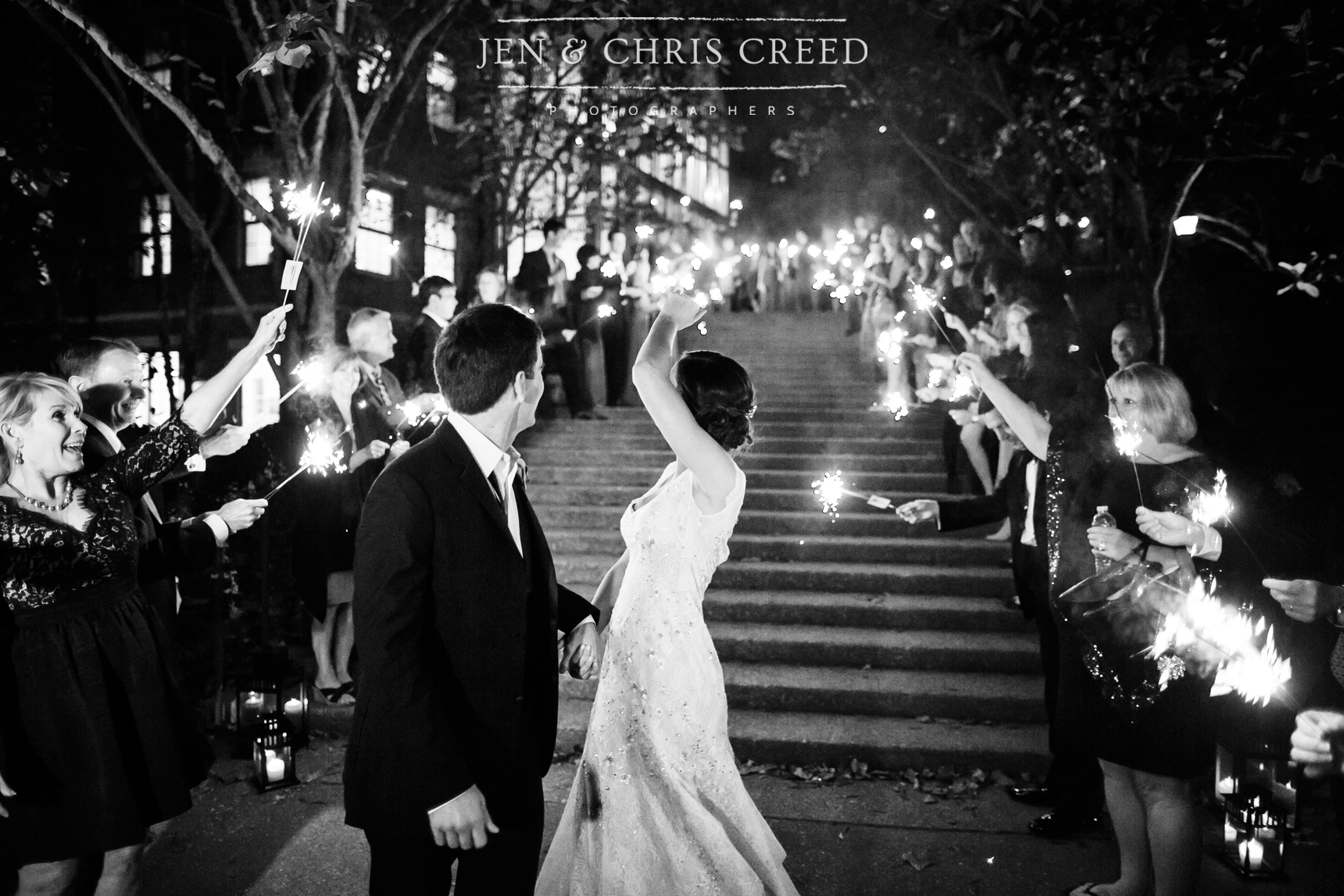bride and groom with sparkler exit