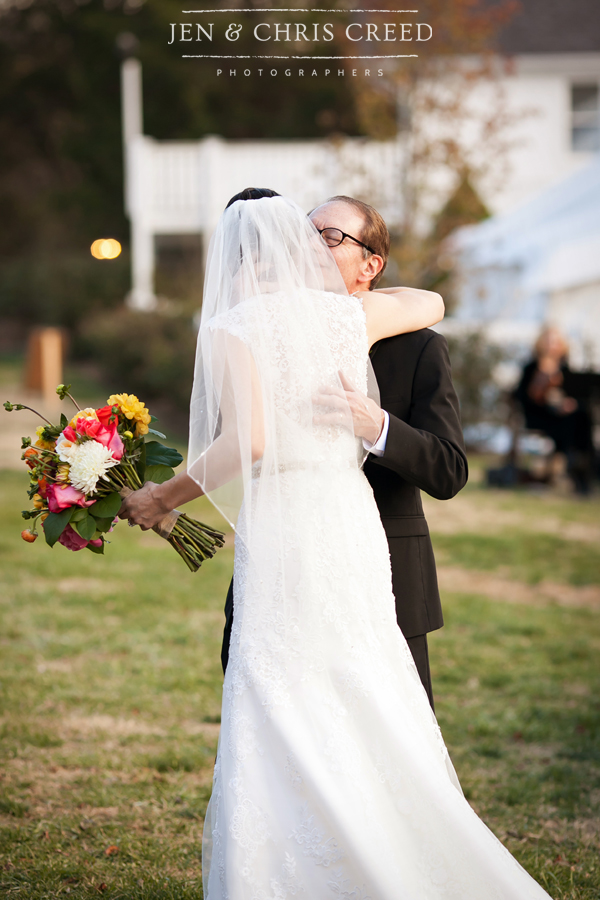 father giving away bride