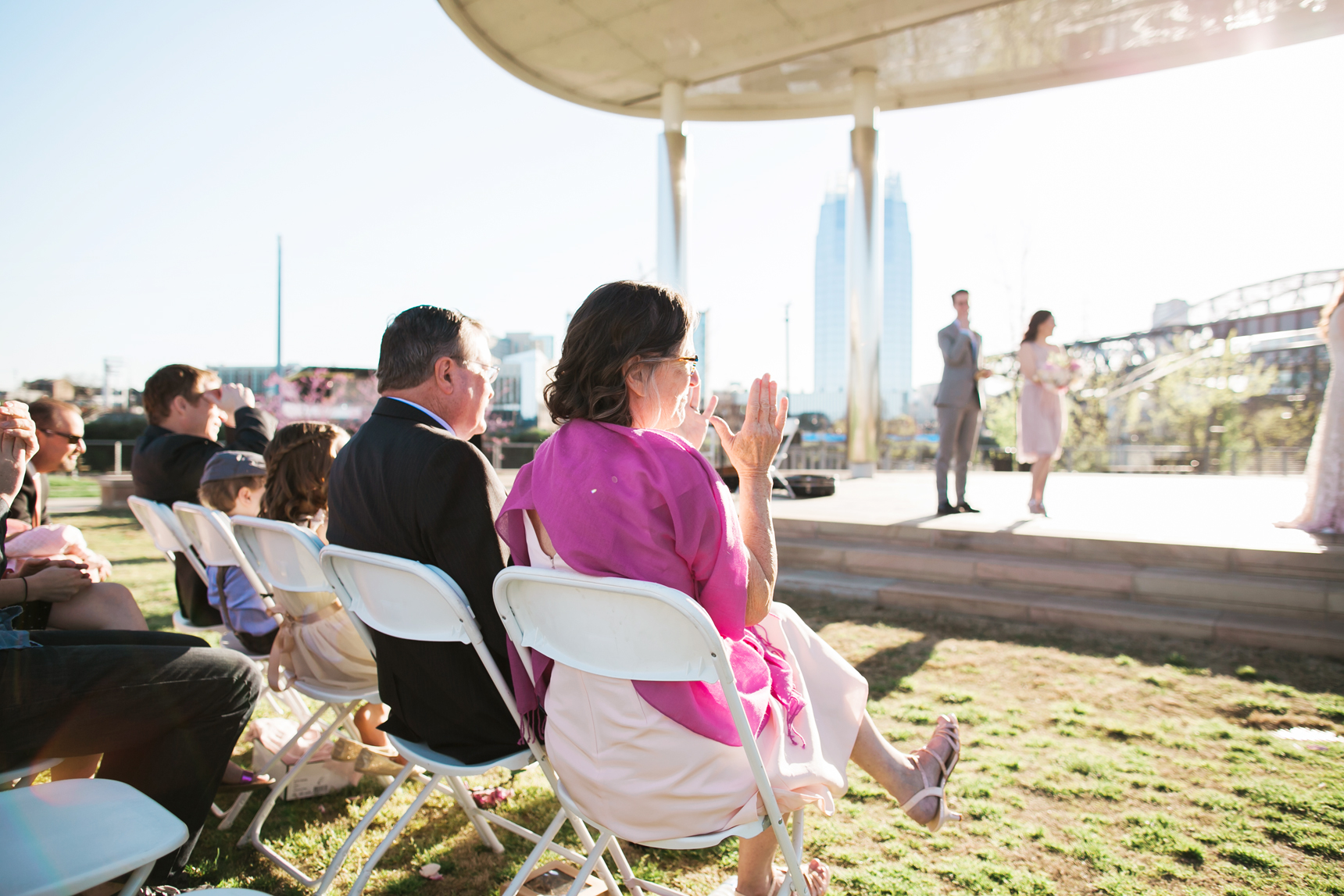 mom clapping after wedding