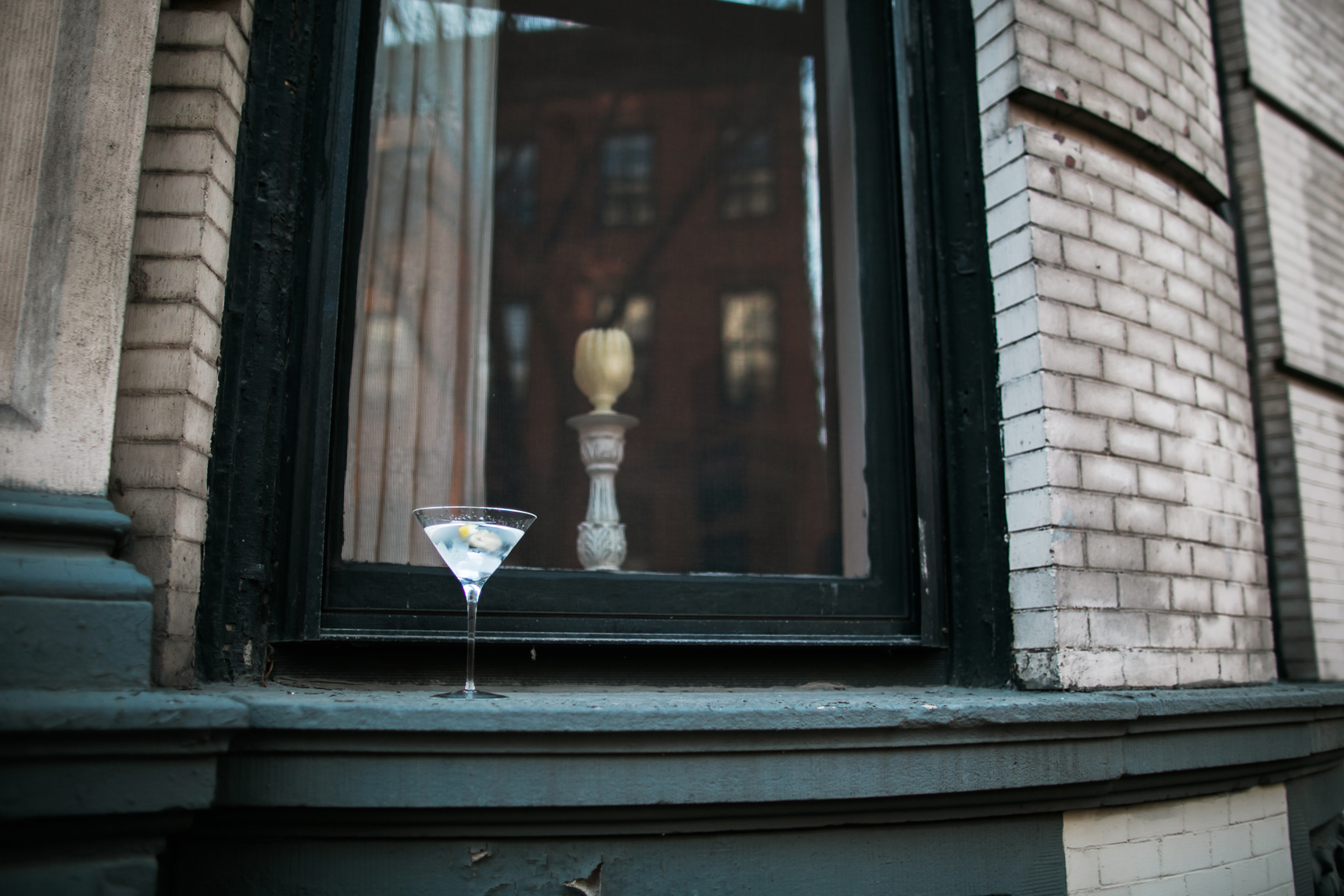 martini on window sill