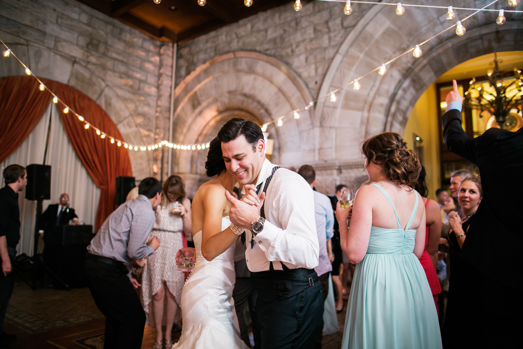 candid bride and groom at reception