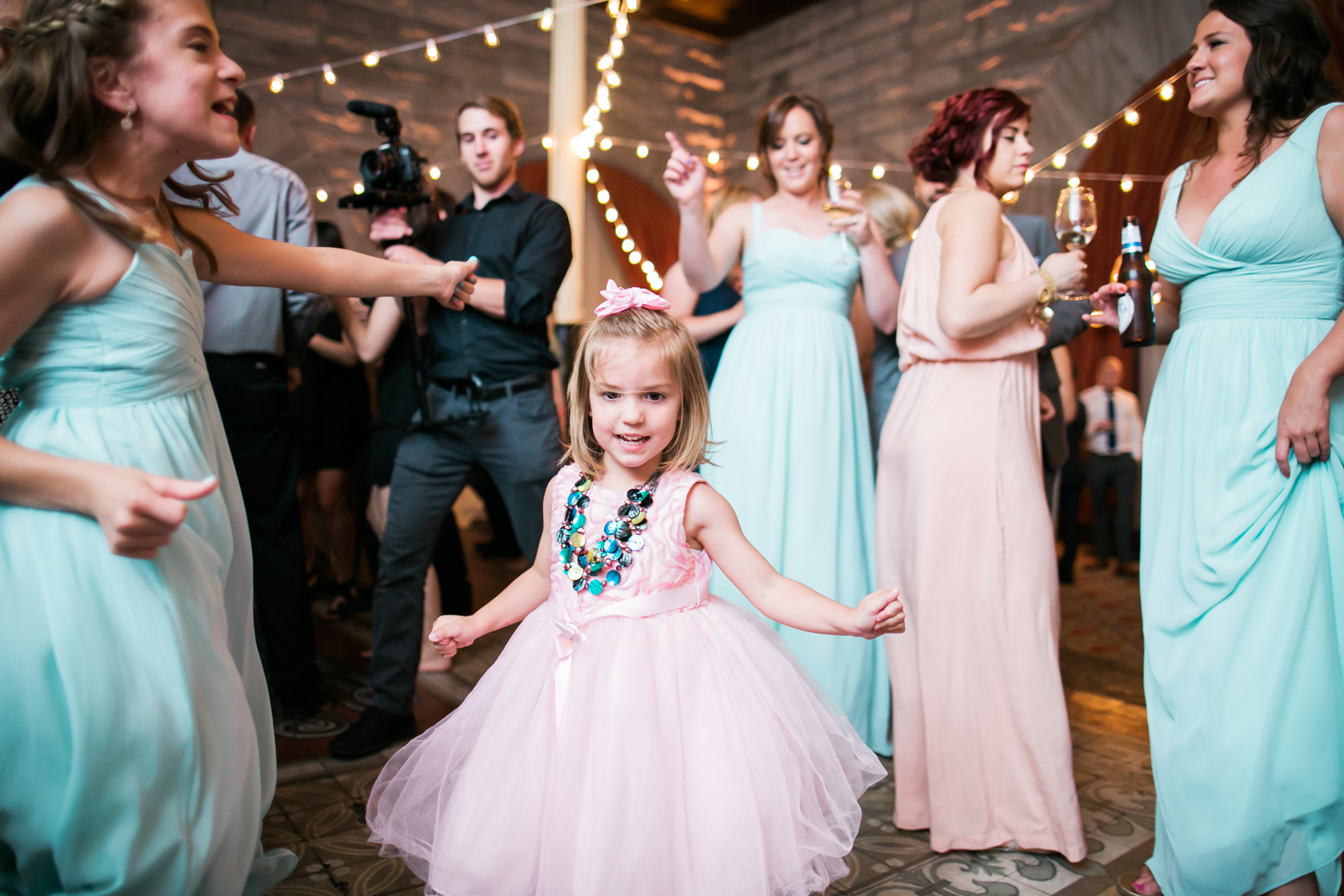 toddler dancing at wedding