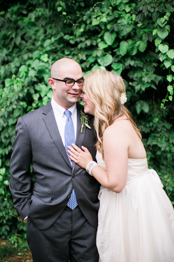 Bride laughing with groom