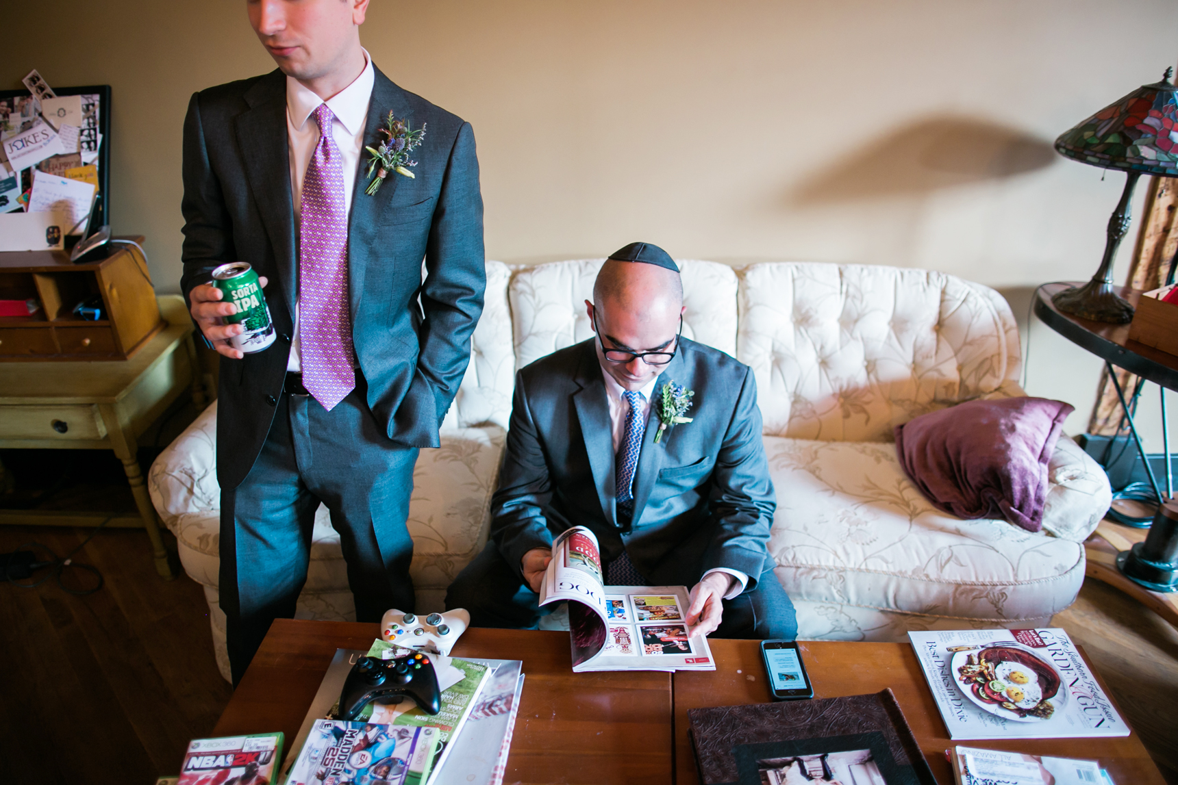 Groom reading magazine