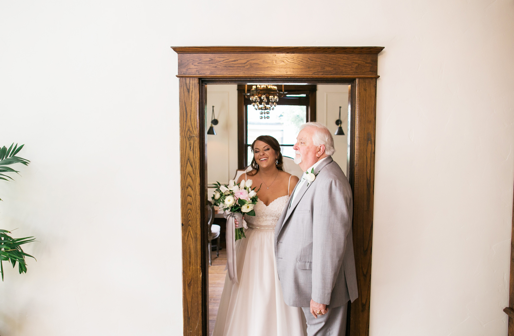 bride laughing with dad