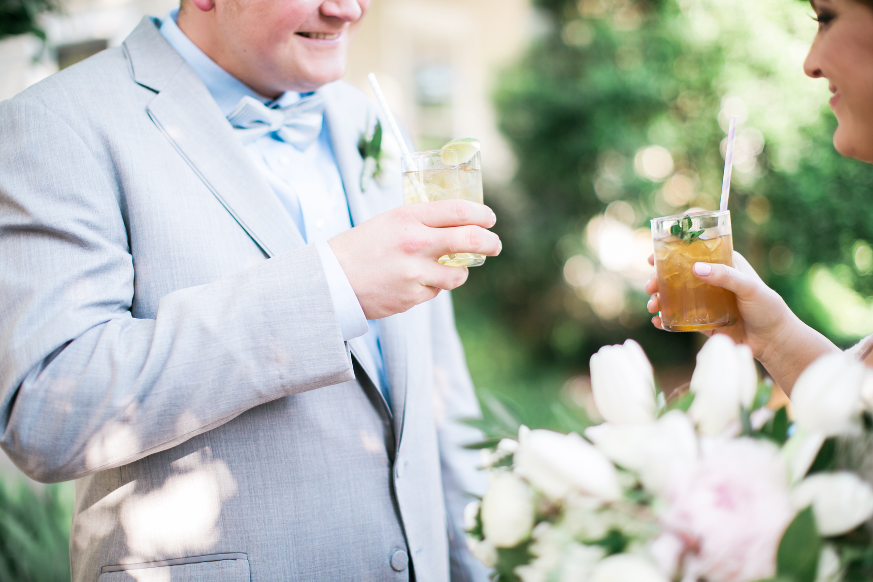 Groom with signature cocktail