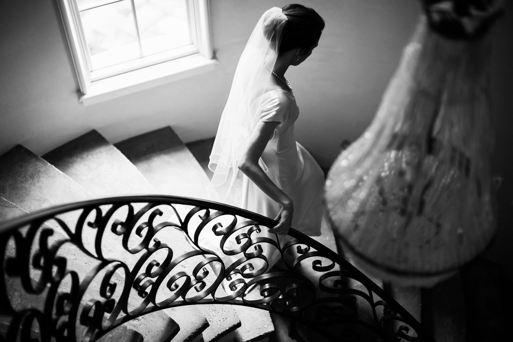 Bride walking down stairs