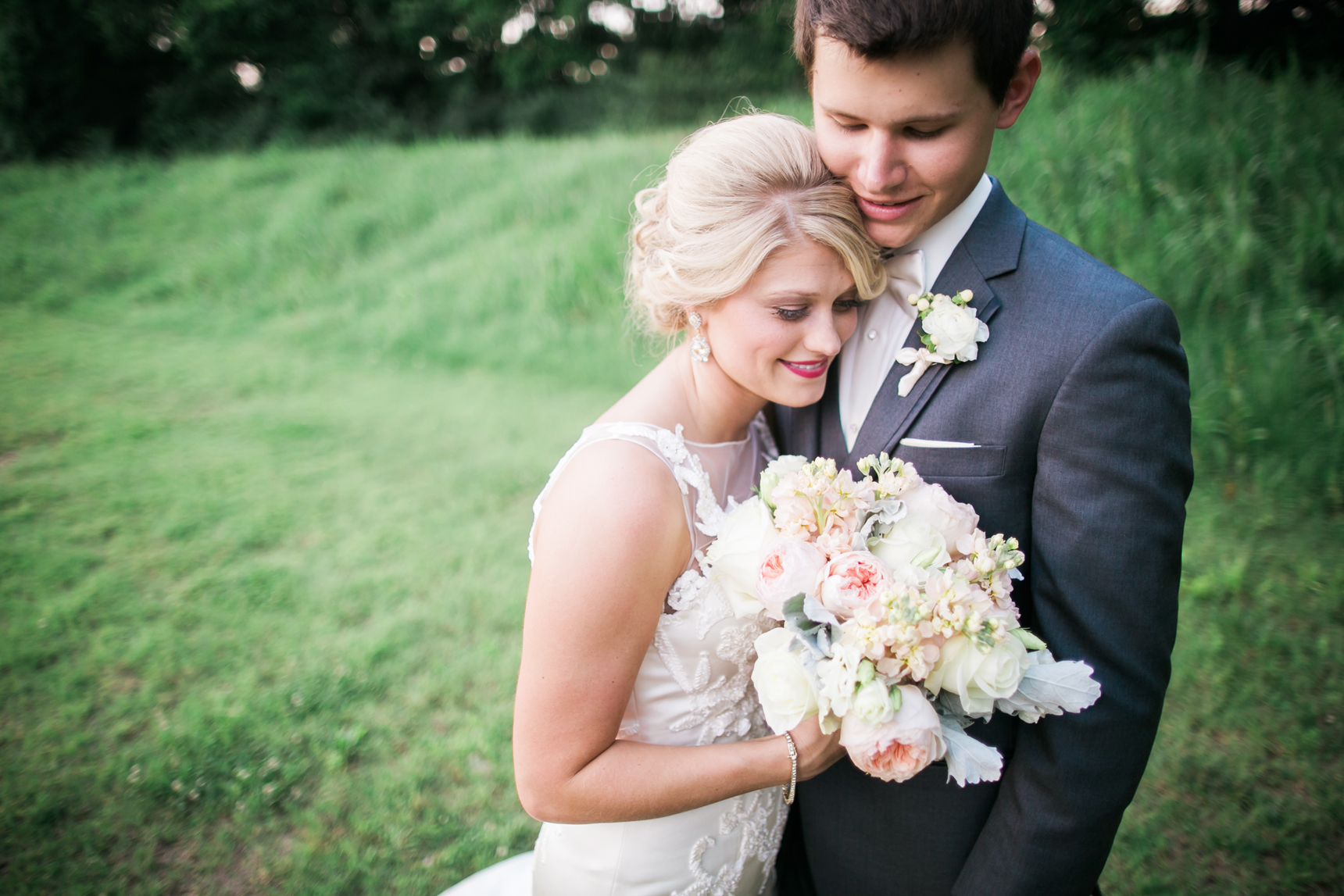 Bride and groom snuggling