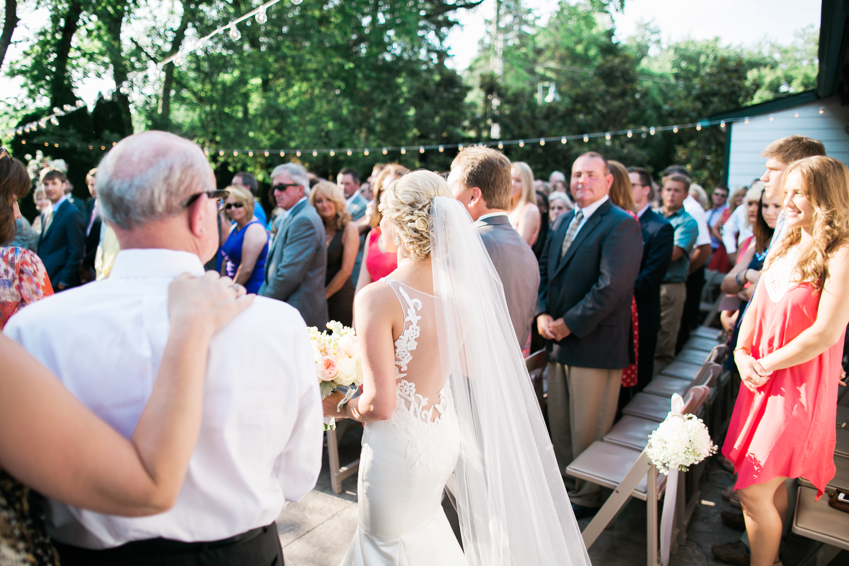 Dad walking bride down the aisle