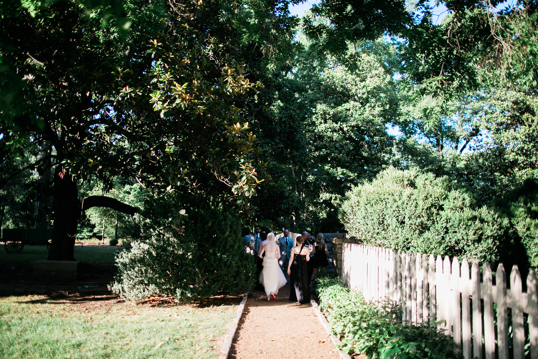 Bride walking down path