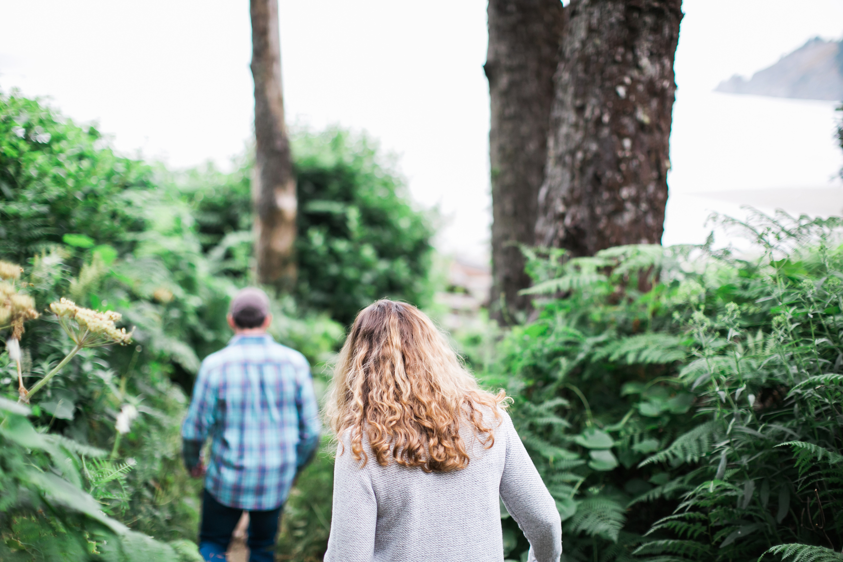 Couple hiking to beach