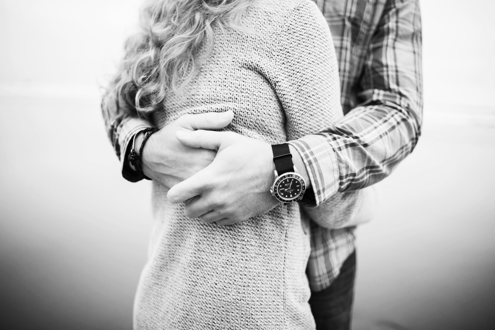 Couple hugging on beach