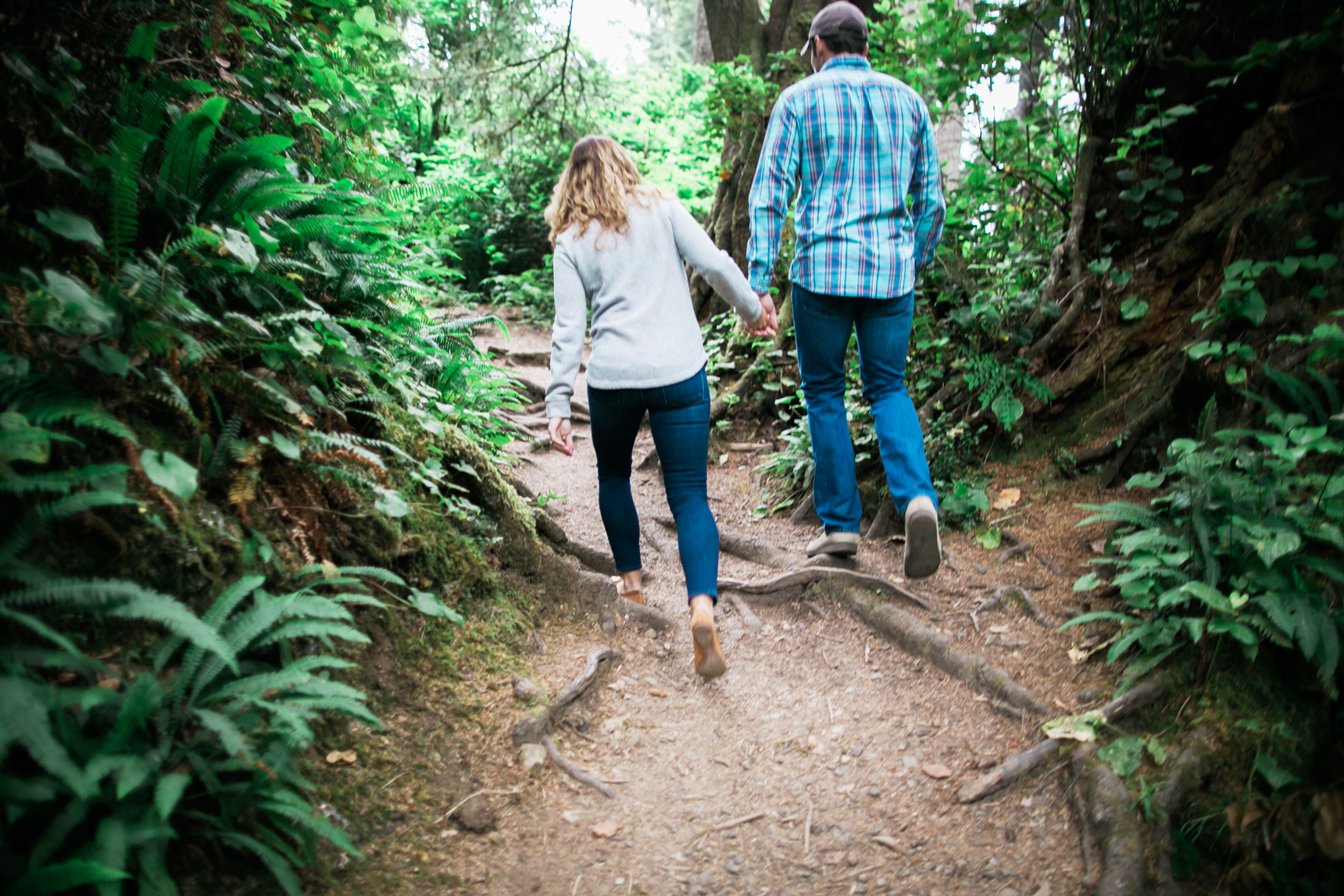 Walking through the woods couple