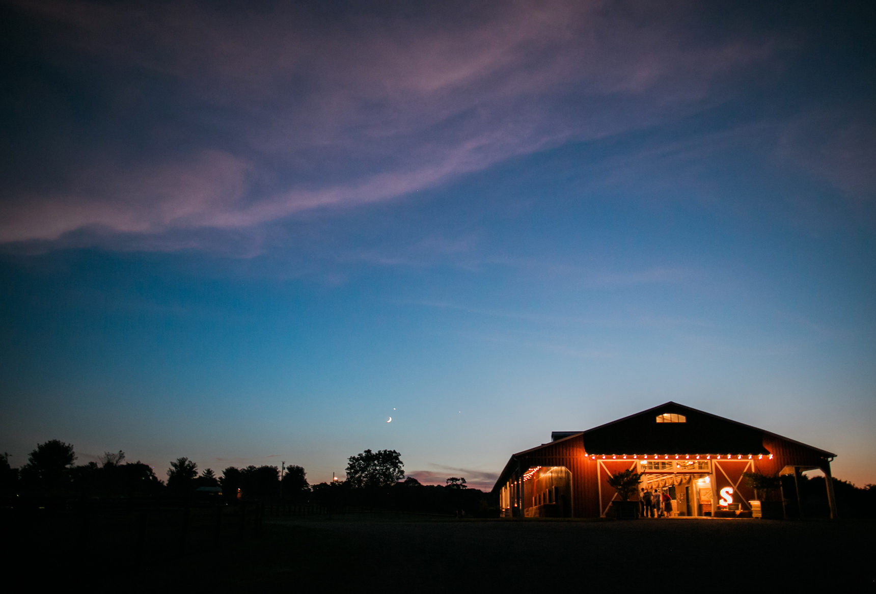 barn reception at sunset