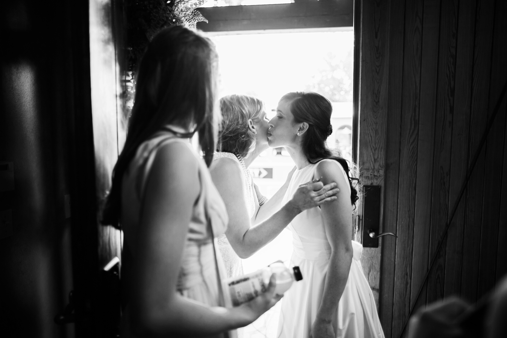 Bride kissing mom