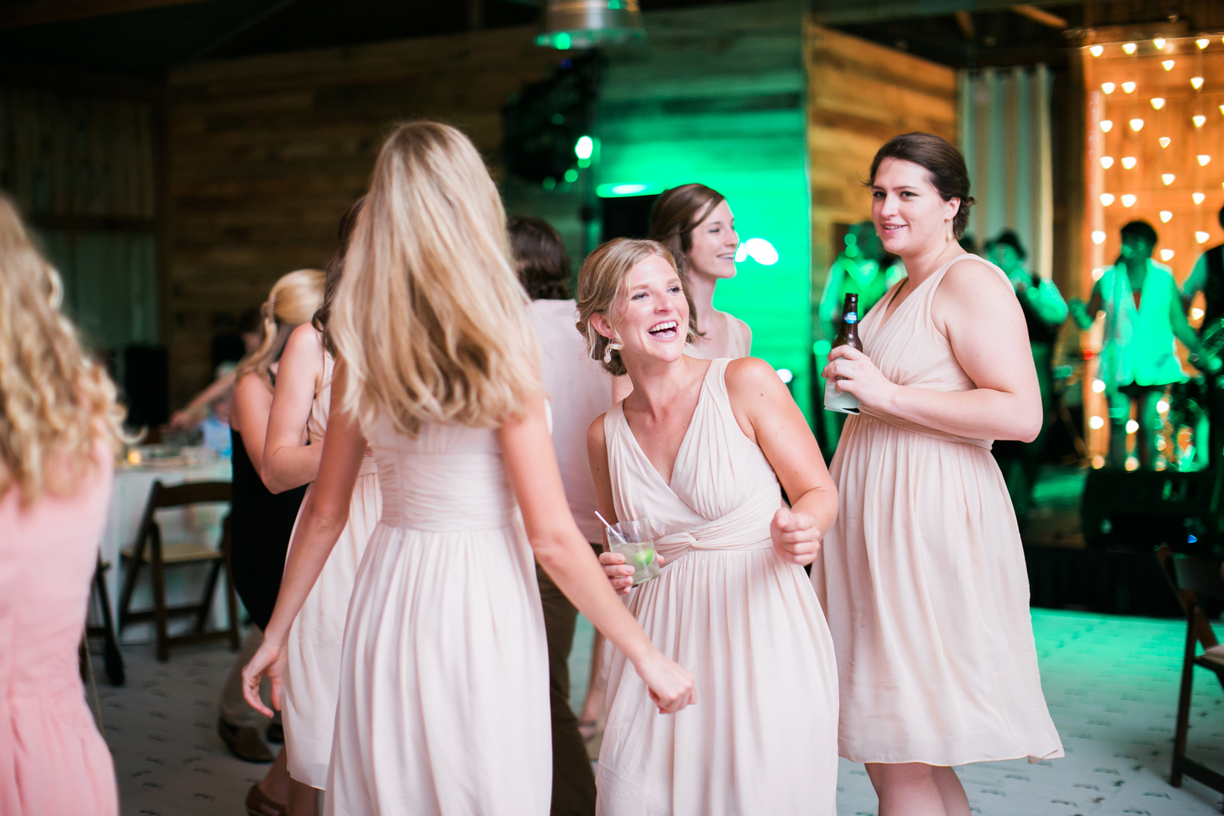 Bridesmaids dancing at reception