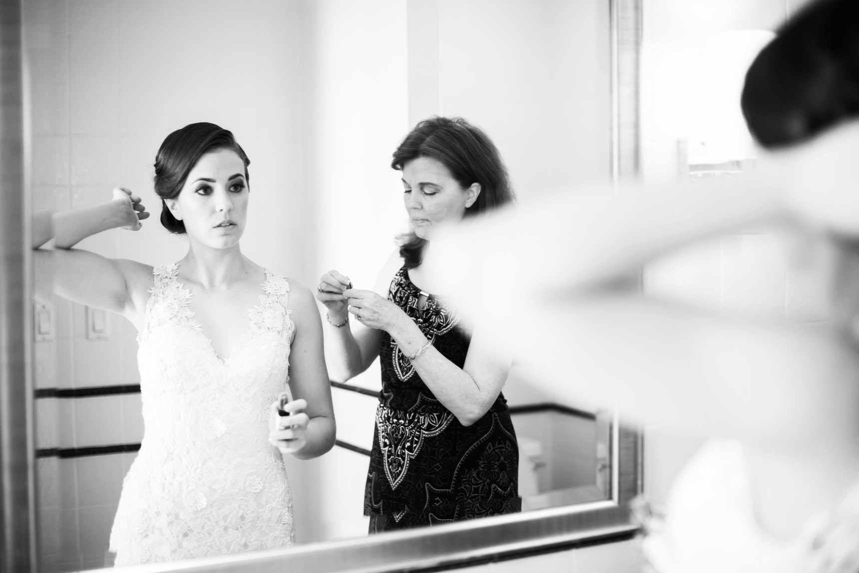 Bride adjusting hair