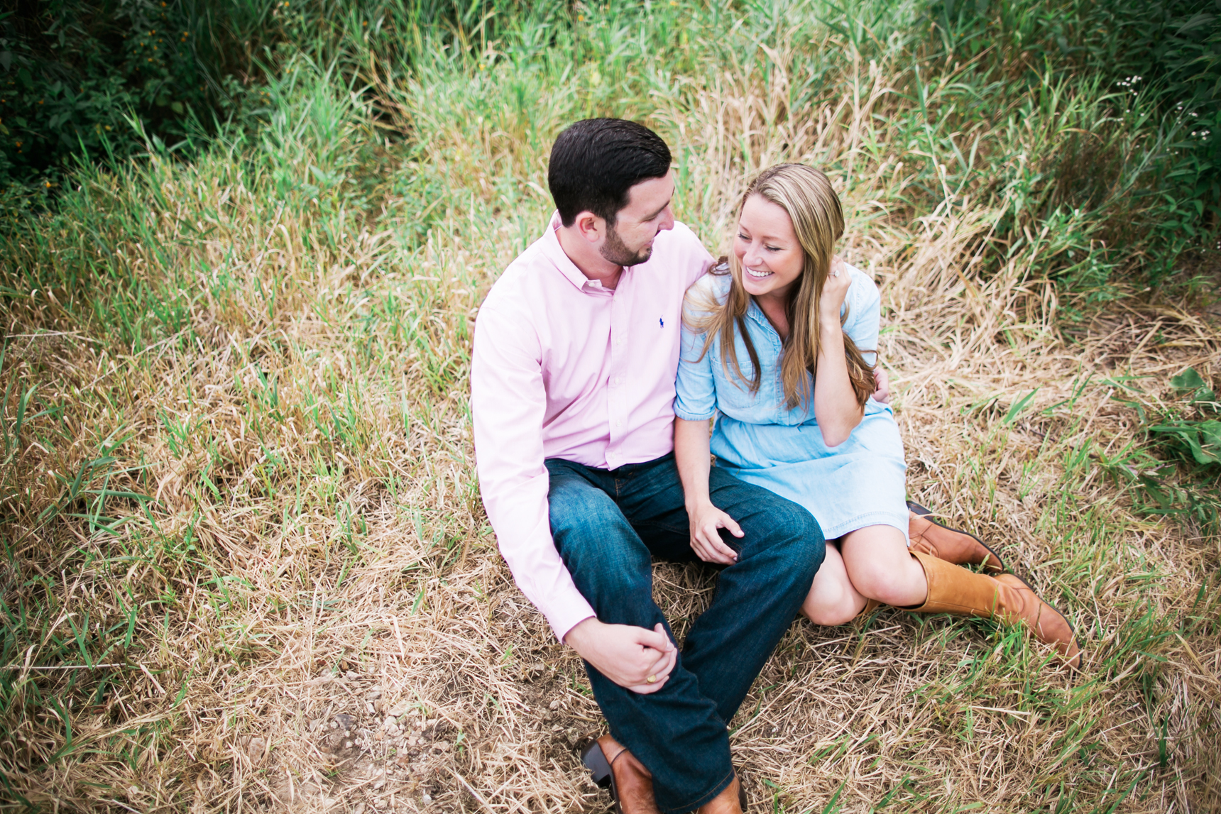 Couple sitting in grass