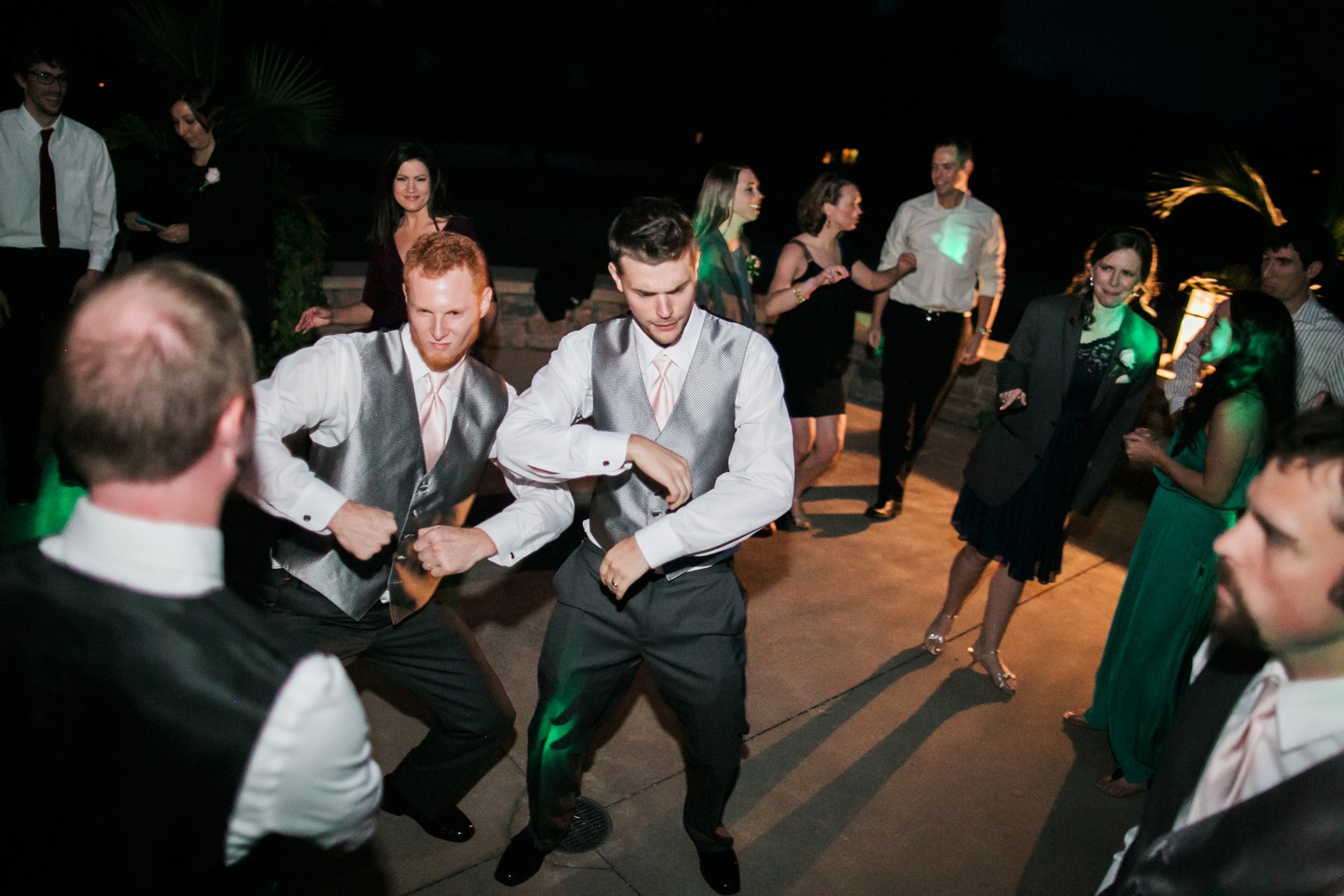 groomsmen dancing at wedding