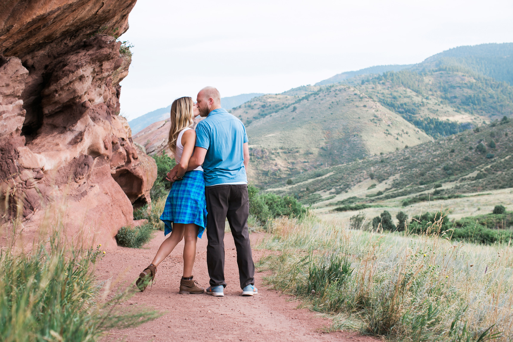 Couple kissing at Red Rocks