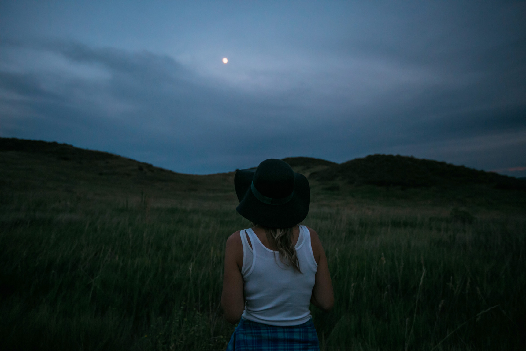 Woman looking at moon