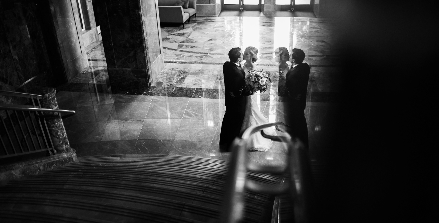 Bride and groom reflection
