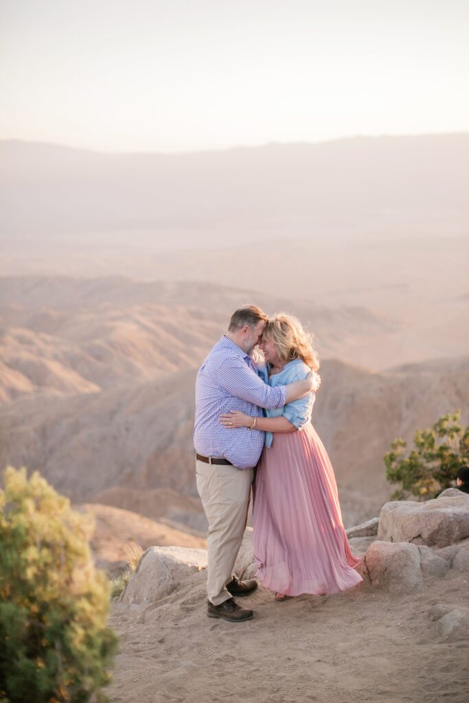 Couple embracing at Keys View in Joshua Tree